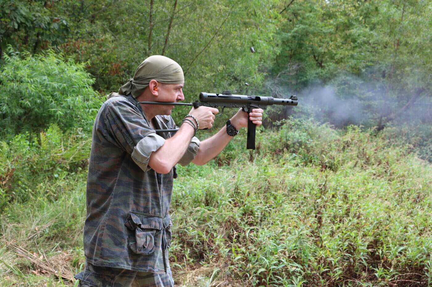 Man shooting the Swedish K firearm