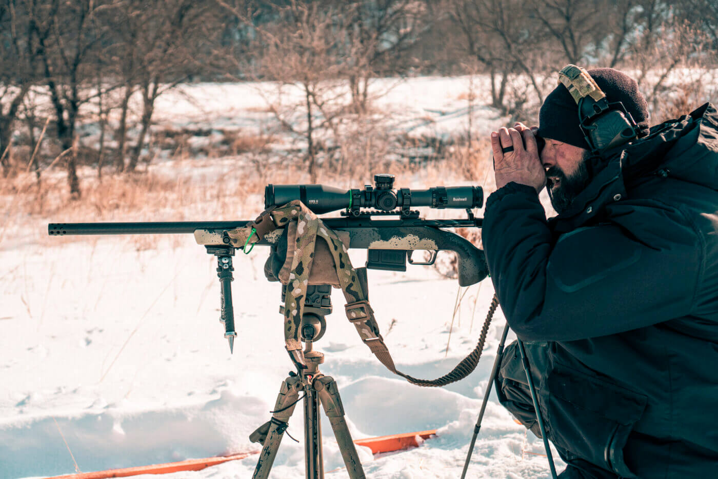 Predator hunting with a rifle on a tripod