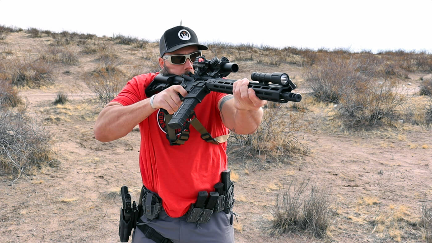 Man on range testing the Rave 140 trigger