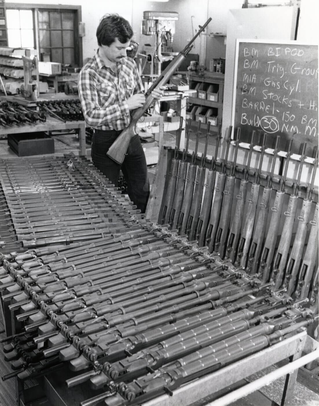 Denny Reese of Springfield Armory inspecting M1A rifles