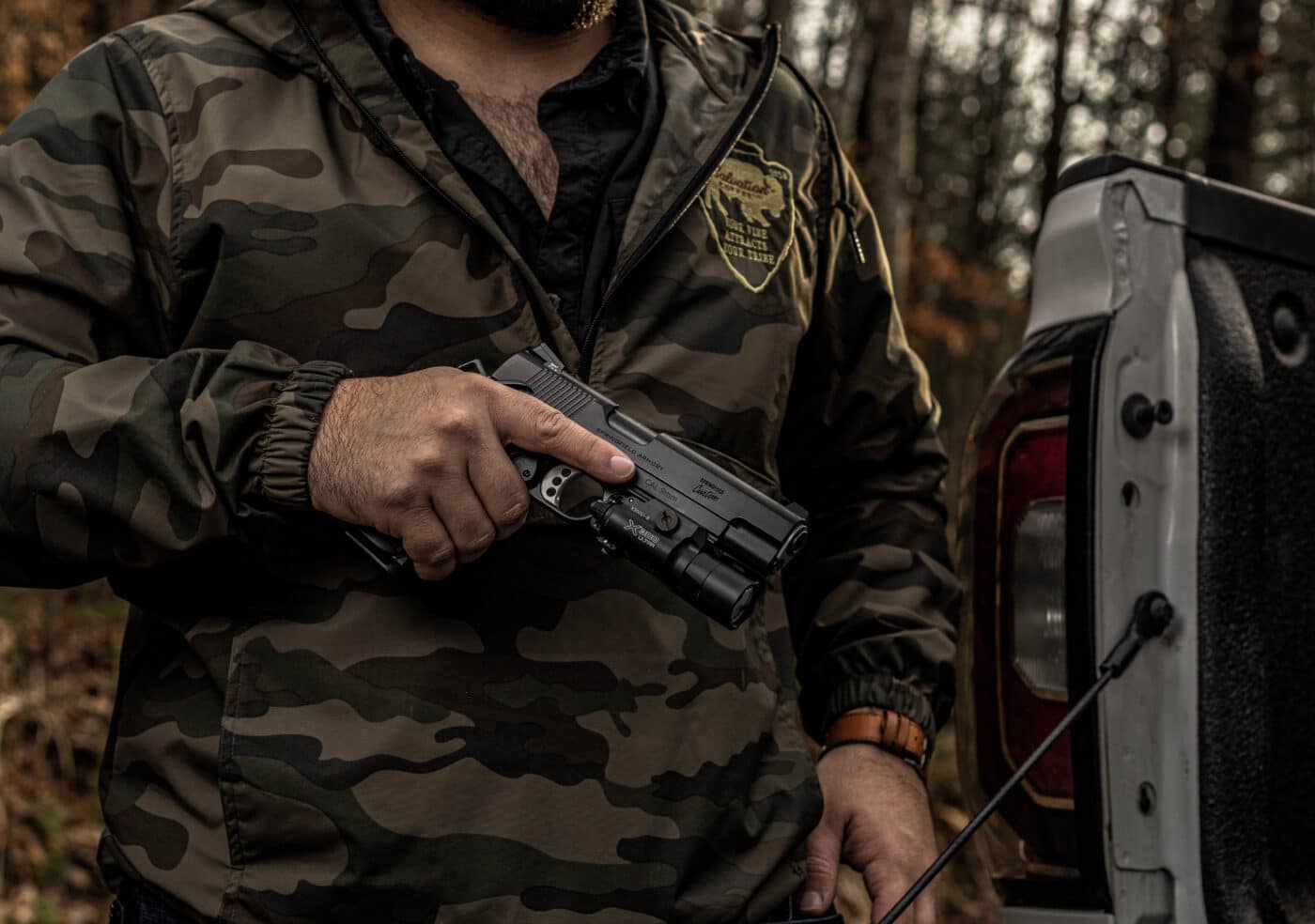 Man carrying custom-grade 1911 pistol