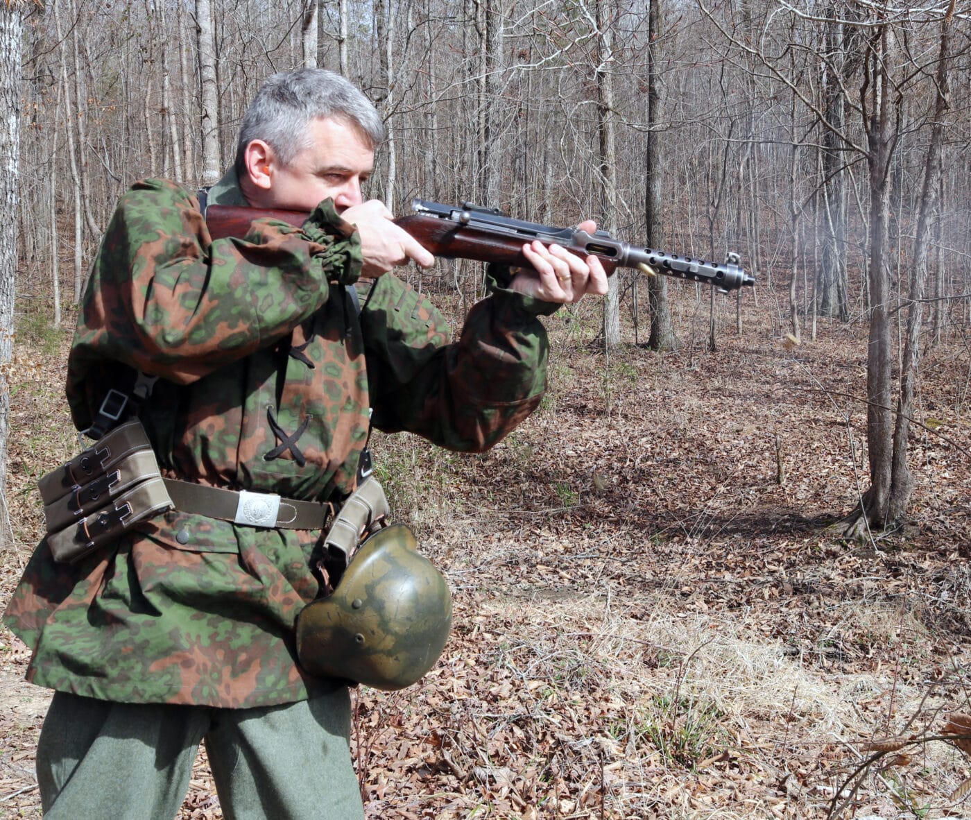 Man dressed as Waffen SS using MP34