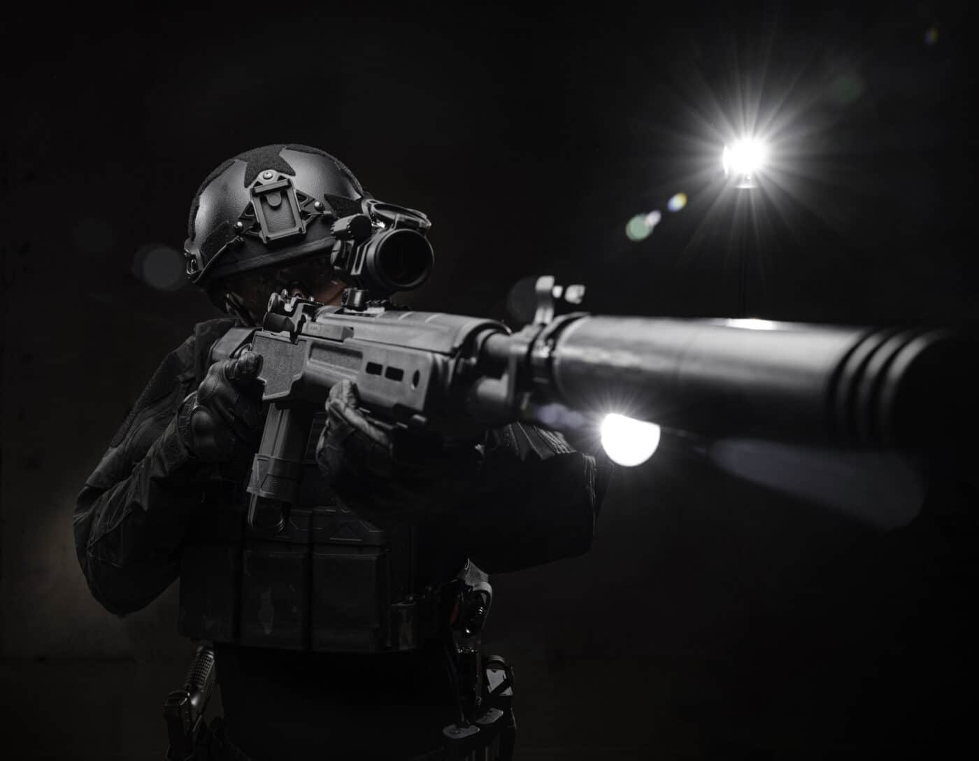 Springfield Armory Tactical M1A SOCOM 16 CQB being held by man in armor