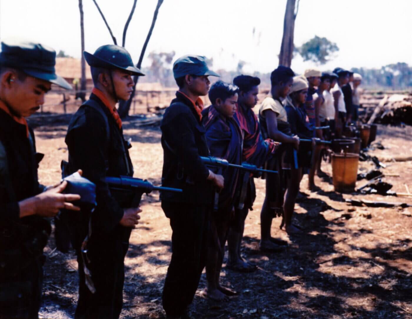 M3 guns held by Montagnard militia men