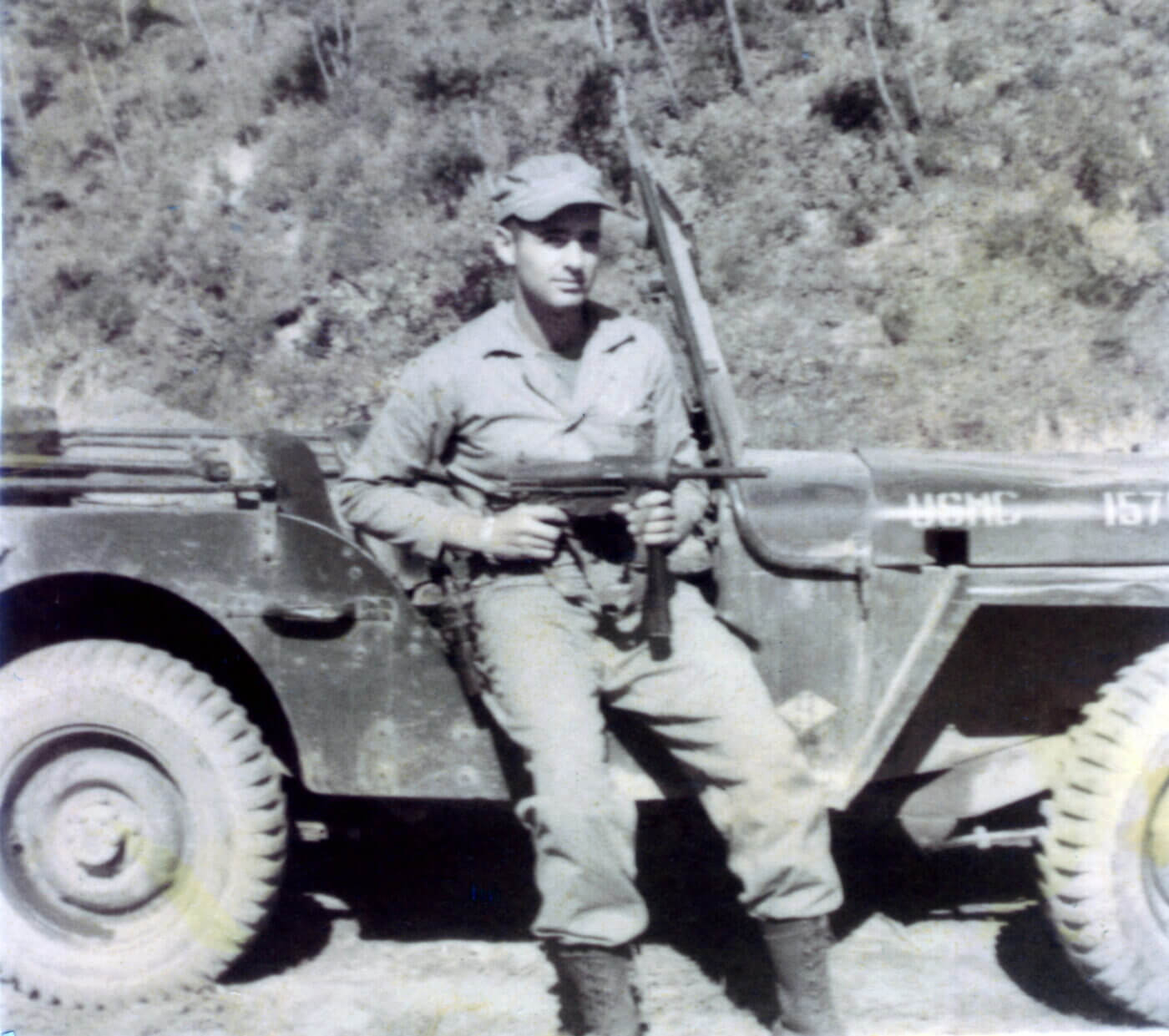 Grease gun held by USMC soldier in 1952 in Korea