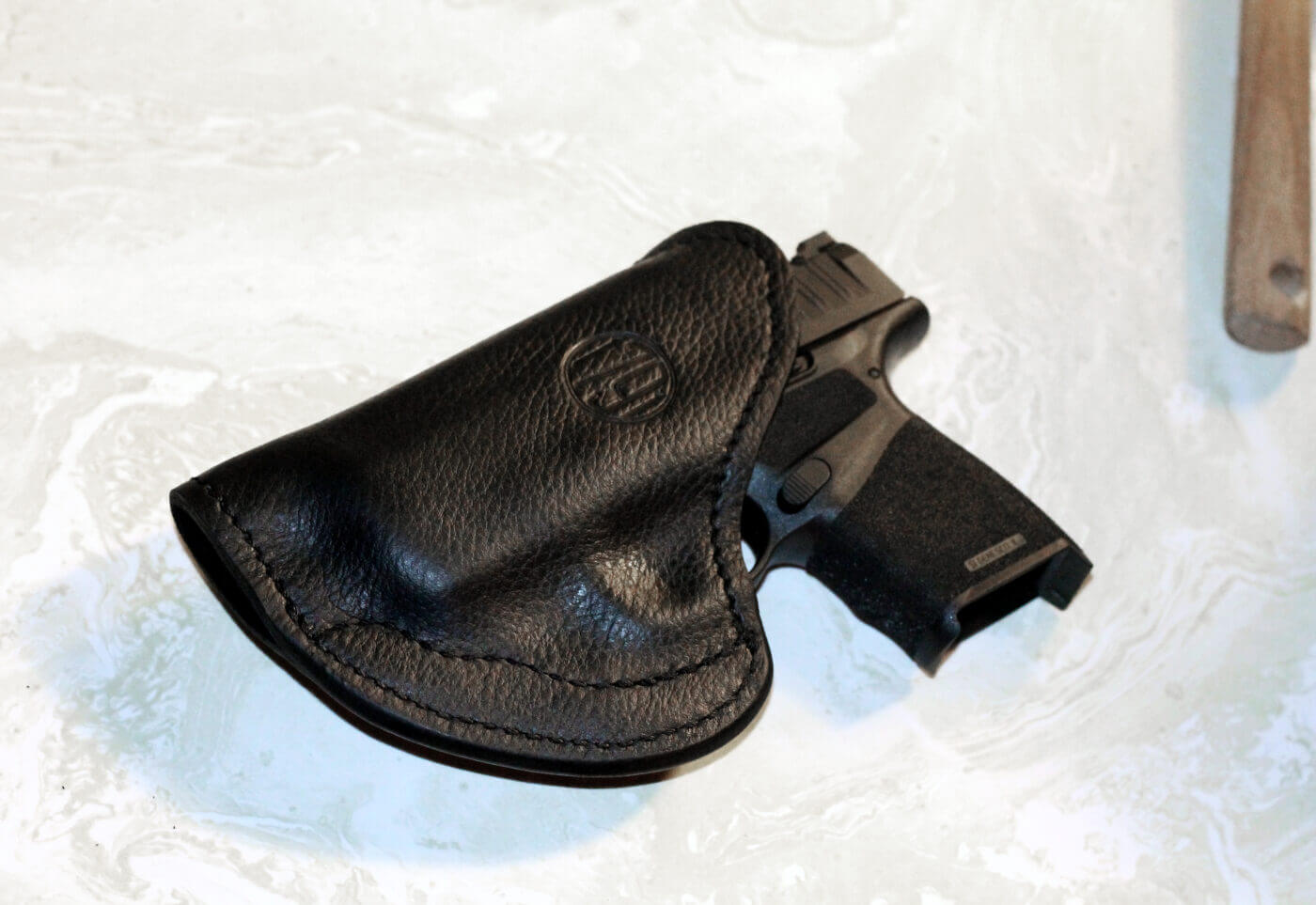 Custom fitting a 1791 Gunleather holster to a Hellcat pistol