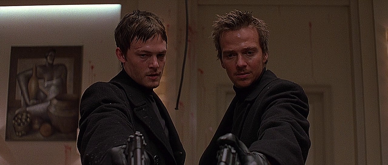 Men holding pistols in The Boondock Saints