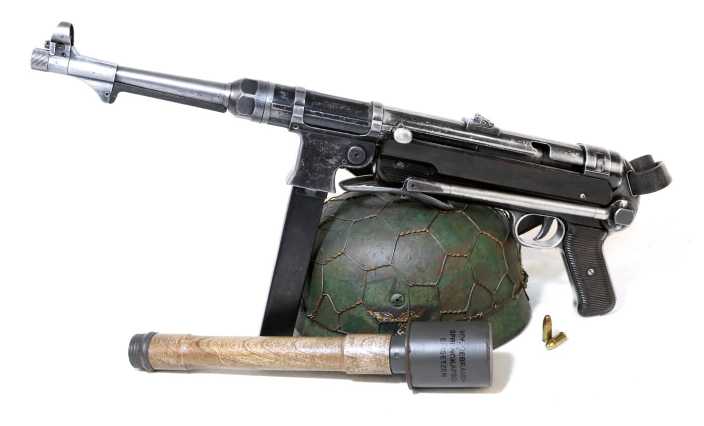 German MP40 with helmet and stick grenade