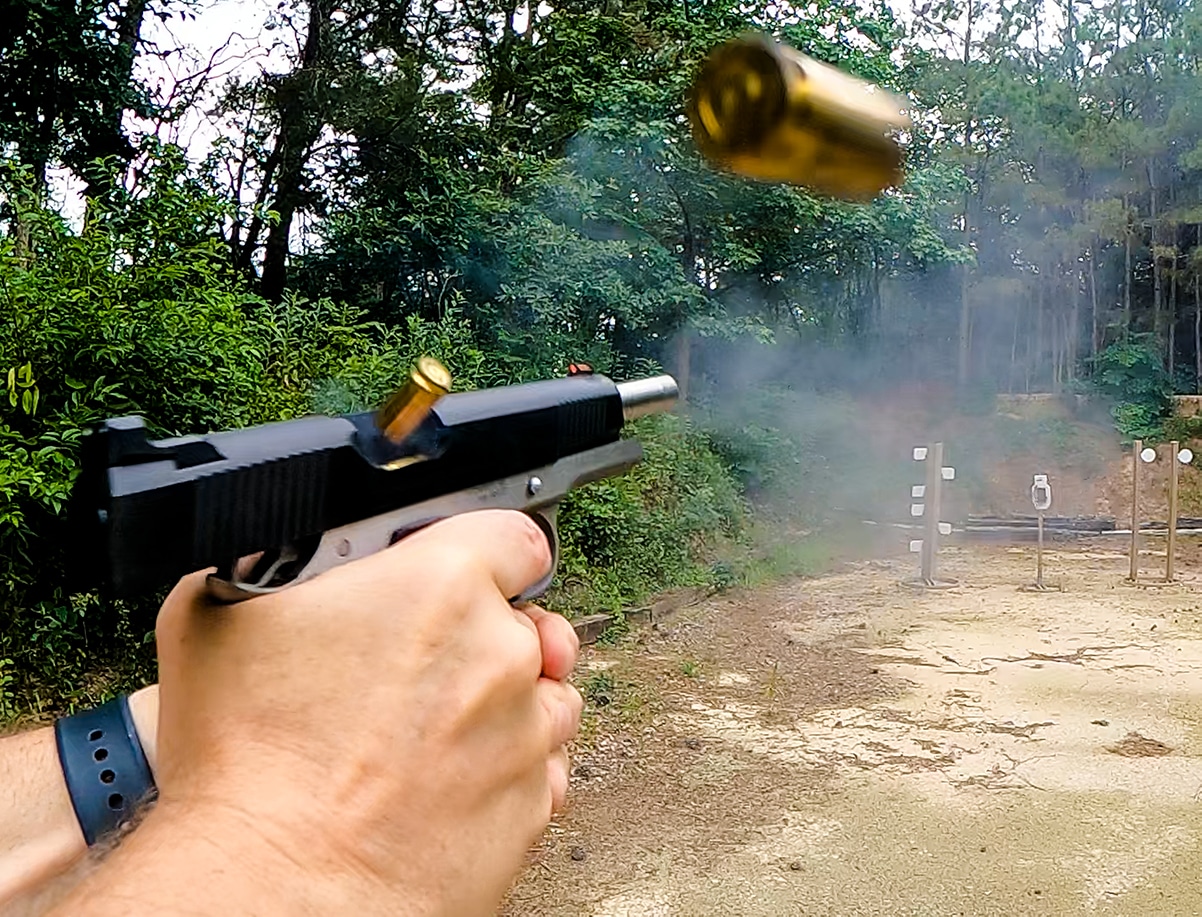 Man shooting Ronin pistol at range