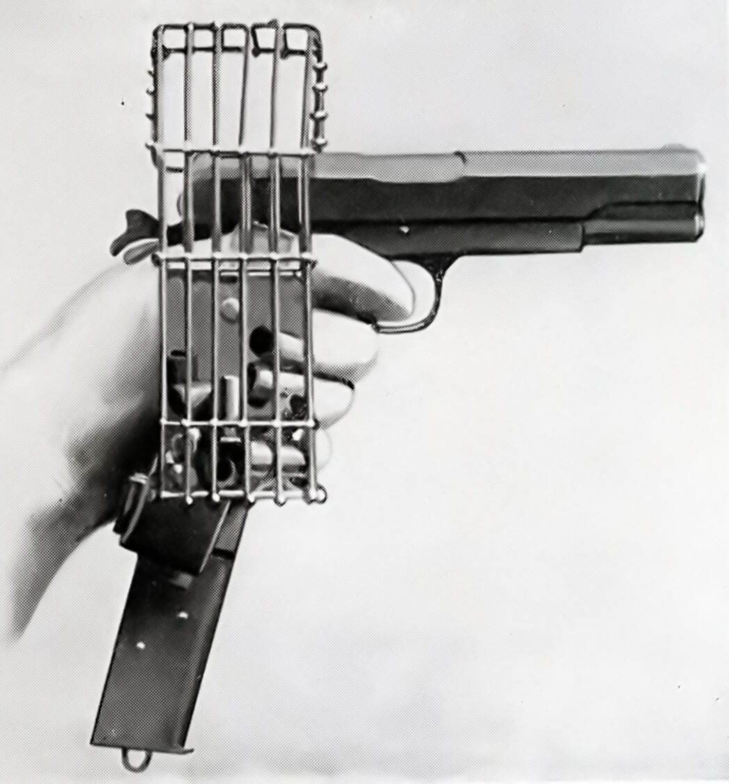 M1911 pistol with cartridge catcher