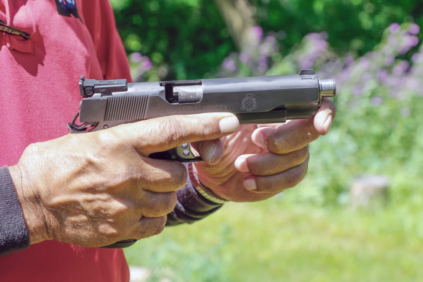 Man showing a true press check of the 1911