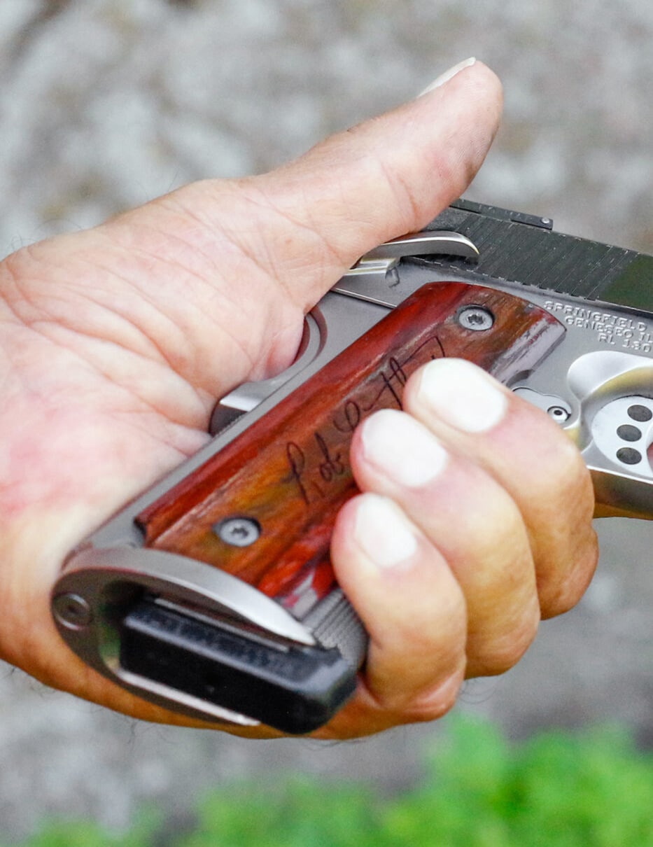 Grasp 1911 to engage safety