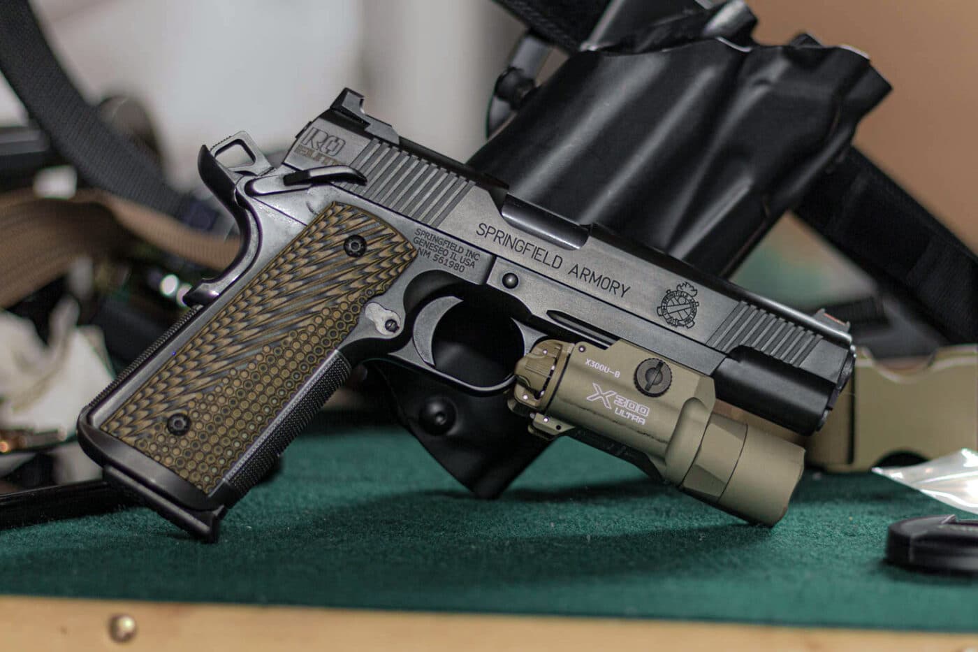 Springfield Armory 1911 handgun with Surefire X300U-B weapon light