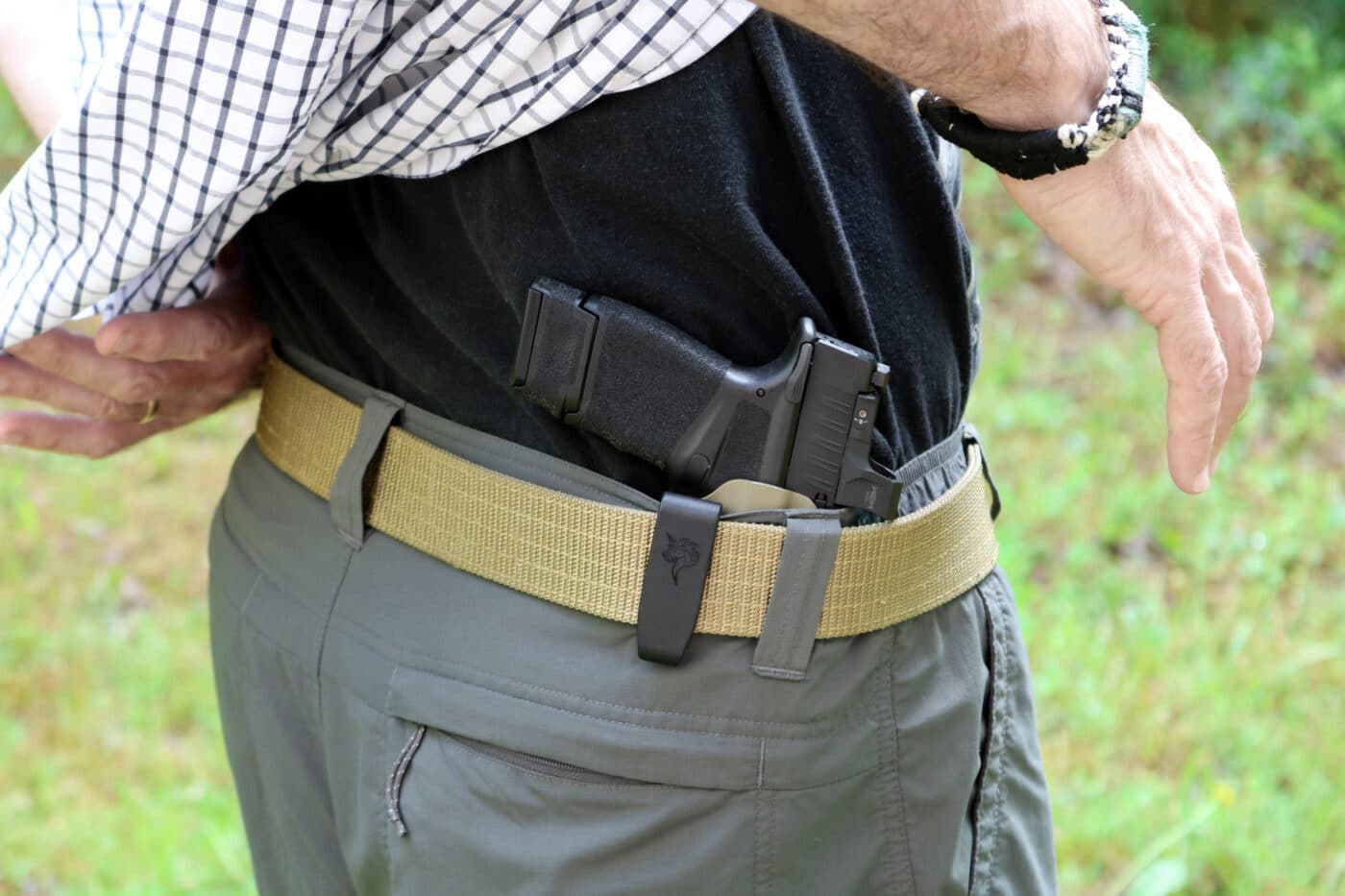 Man showing EDC holster by DeSantis  for Springfield Hellcat