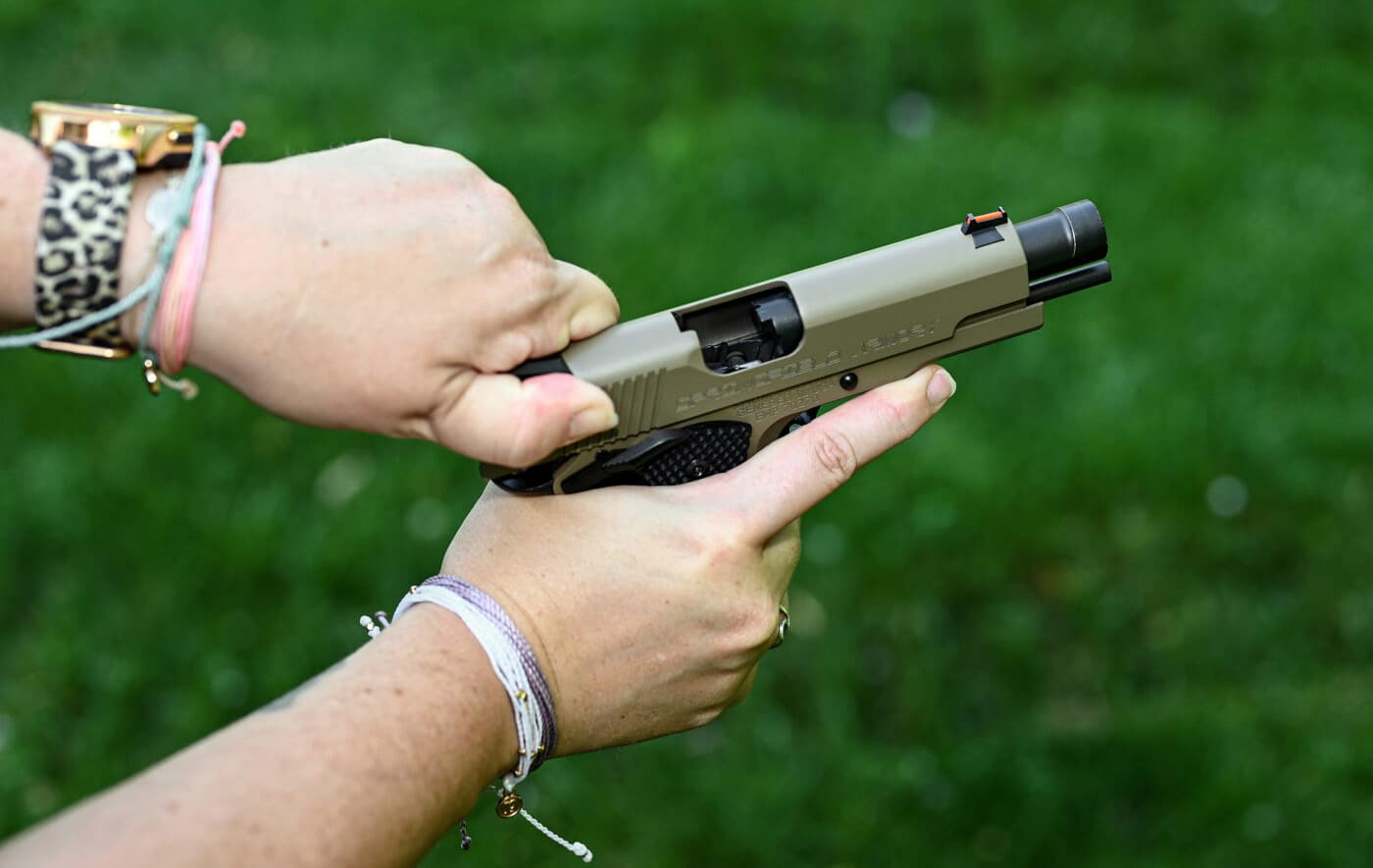 Checking chamber status of pistol