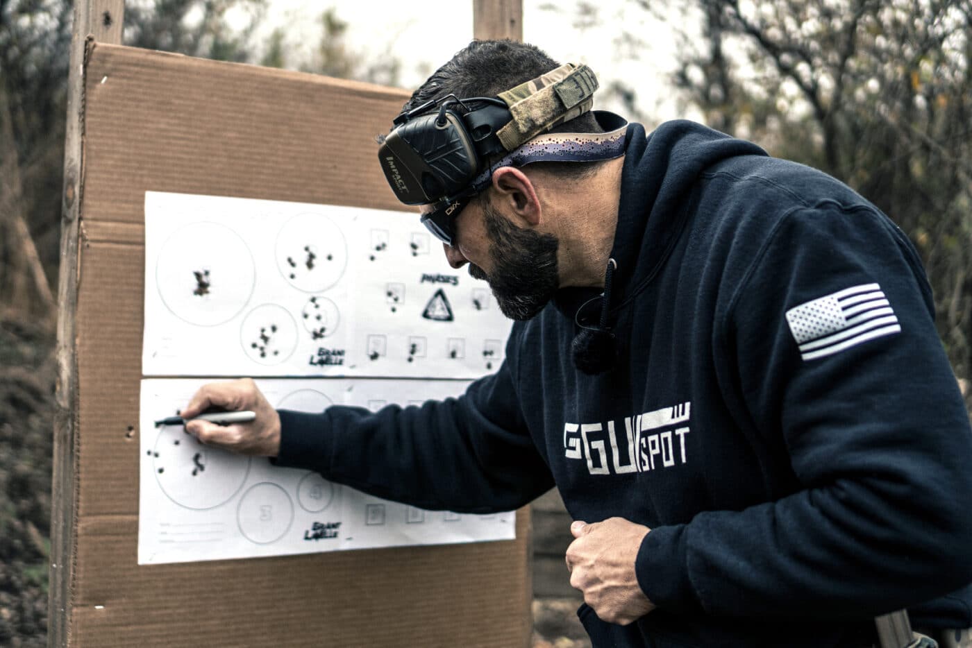 Man looking at target for Phase 5 shooting drill