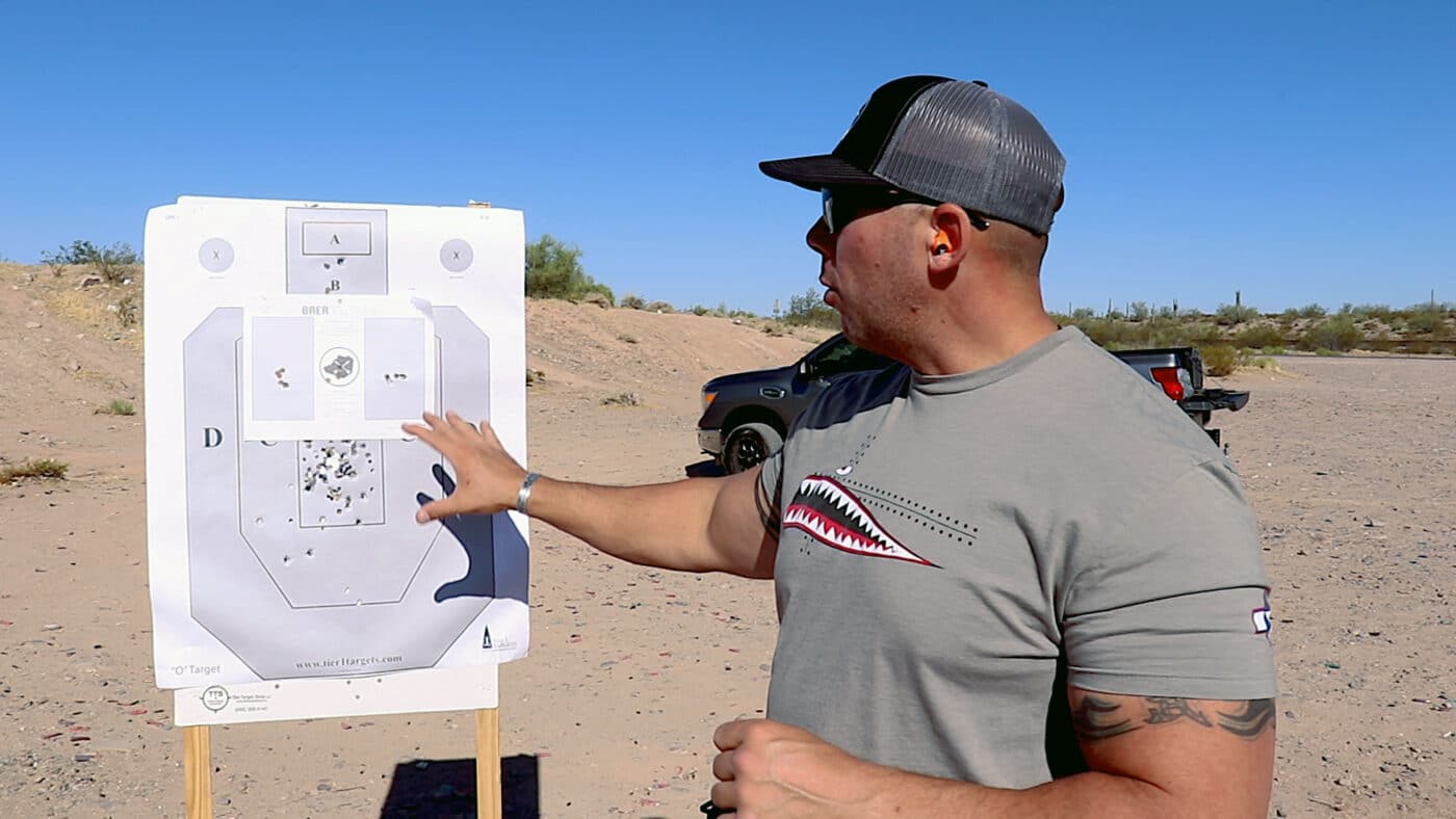 Man analyzing Baer Drill target