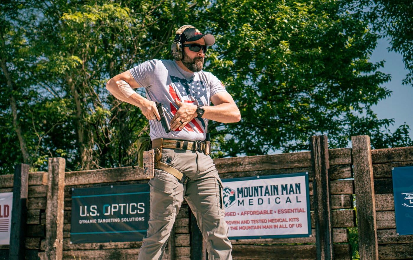 Man drawing the Springfield Marine Corps Operator from concealment