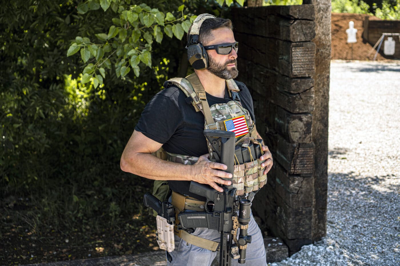 Man with a single point sling attached to an AR-15