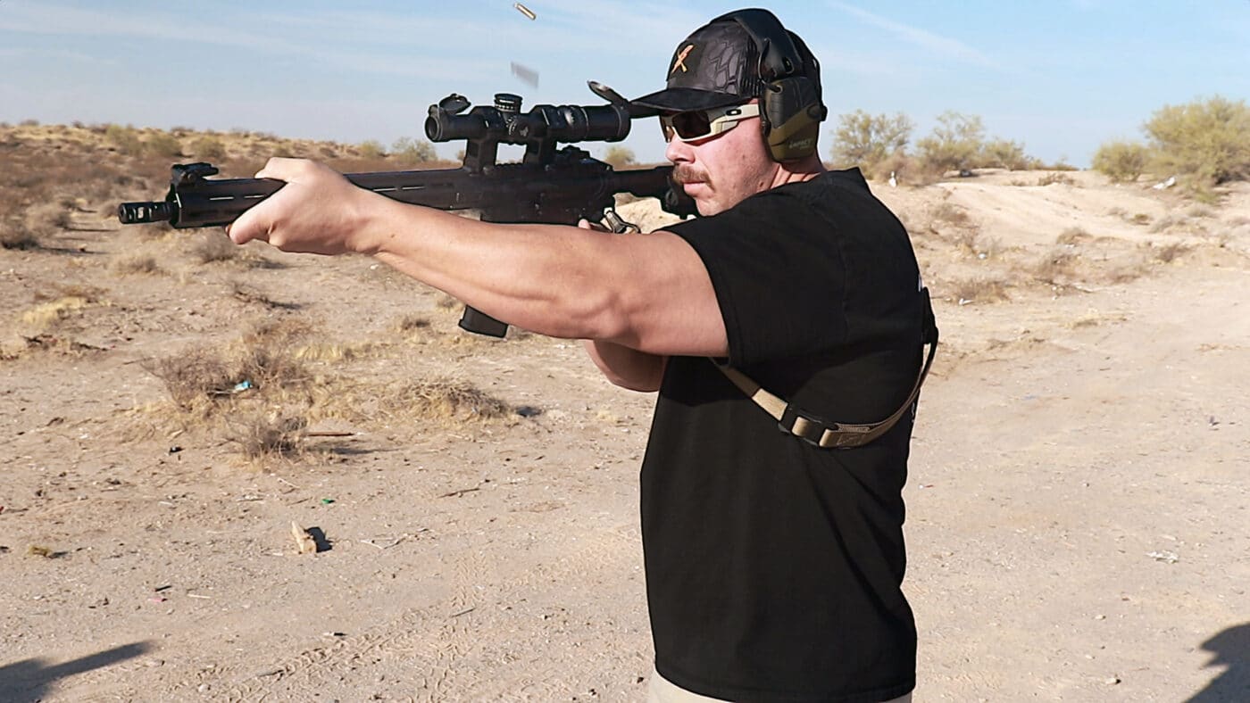 Man testing the Swampfox Arrowhead rifle scope at the range
