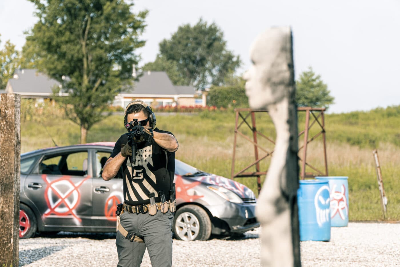 Man training with Rubber Dummies target