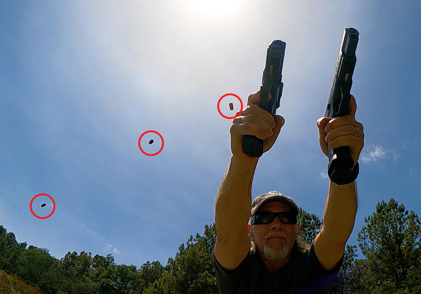 Man dual wielding XD-M Elite pistols