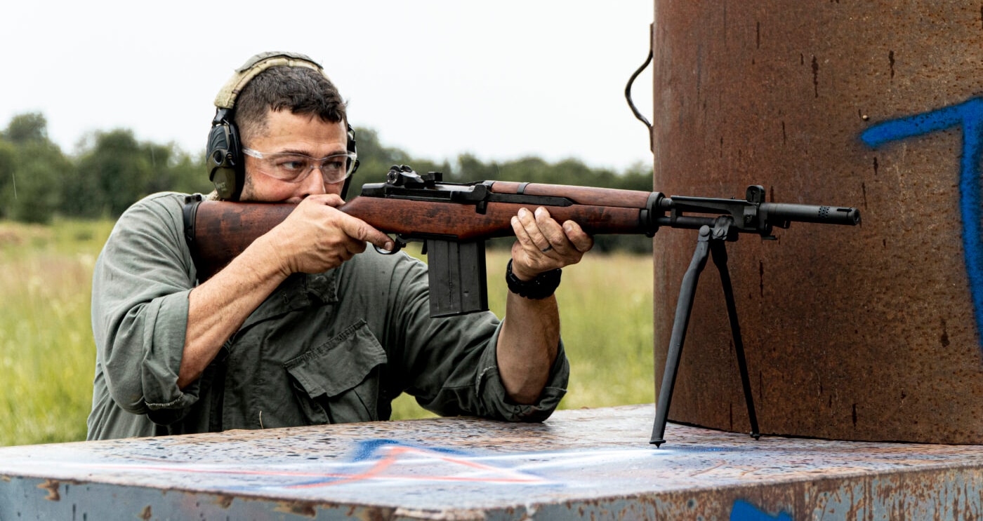 Man shooting rifle with 7.62x51 NATO round at 750 rounds per minute