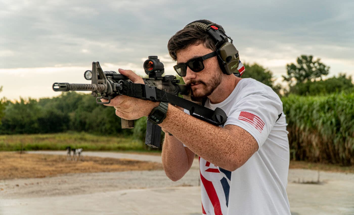 Man demonstrating how to shoot with a two-point sling