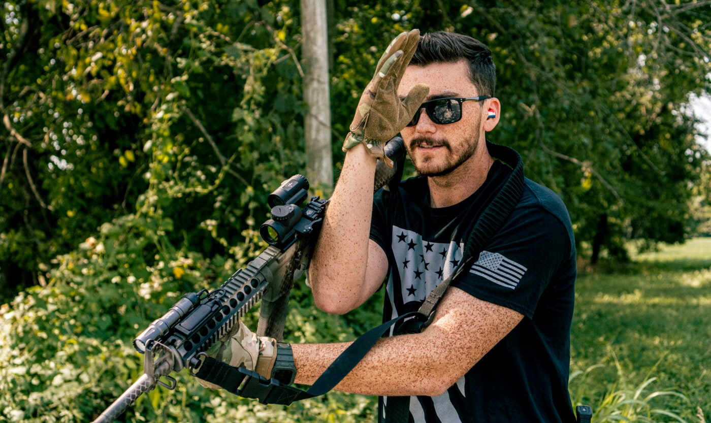 Man swimming out of an AR two-point sling