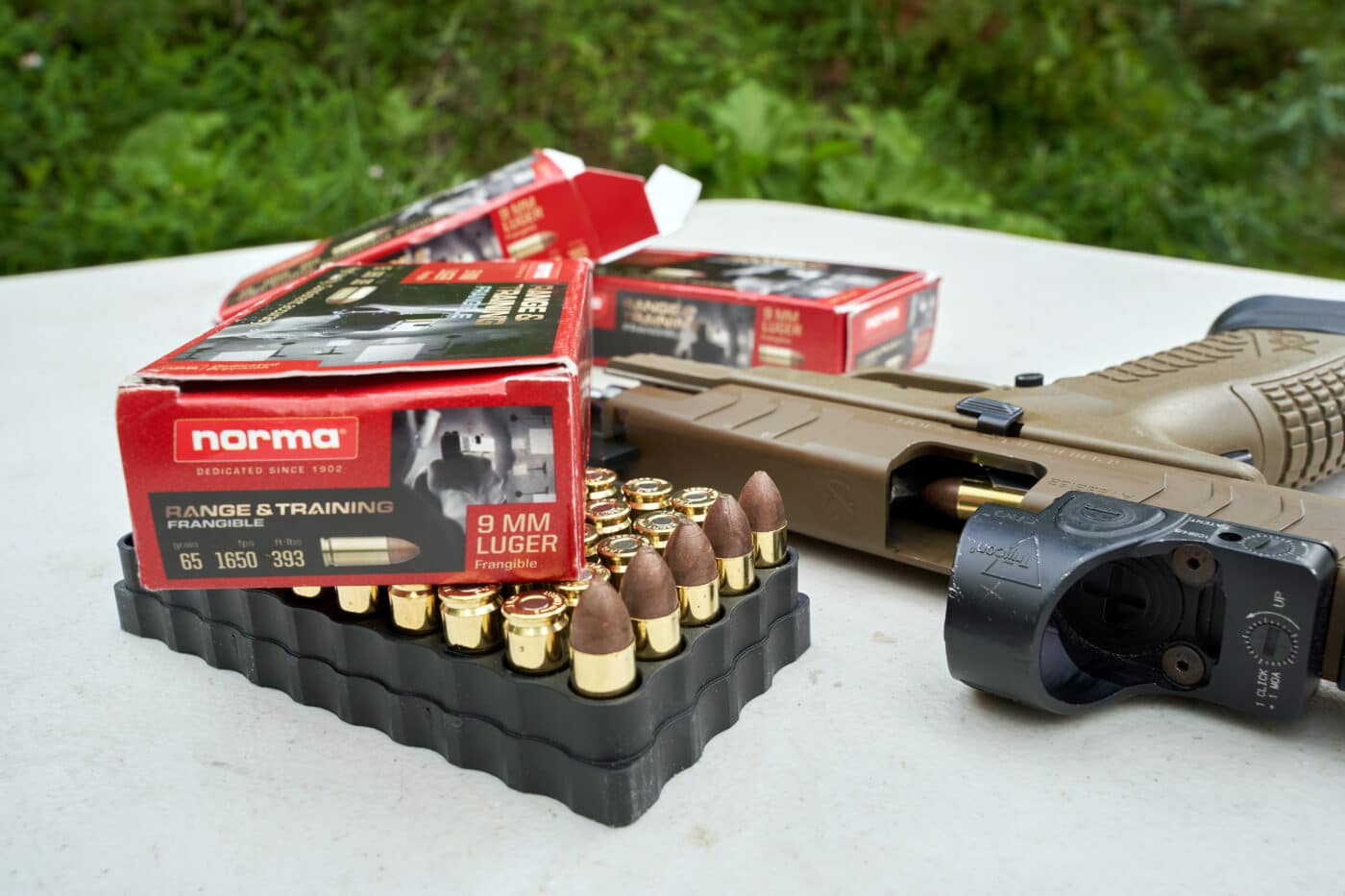 Norma Range and Training Frangible ammunition next to Springfield pistol