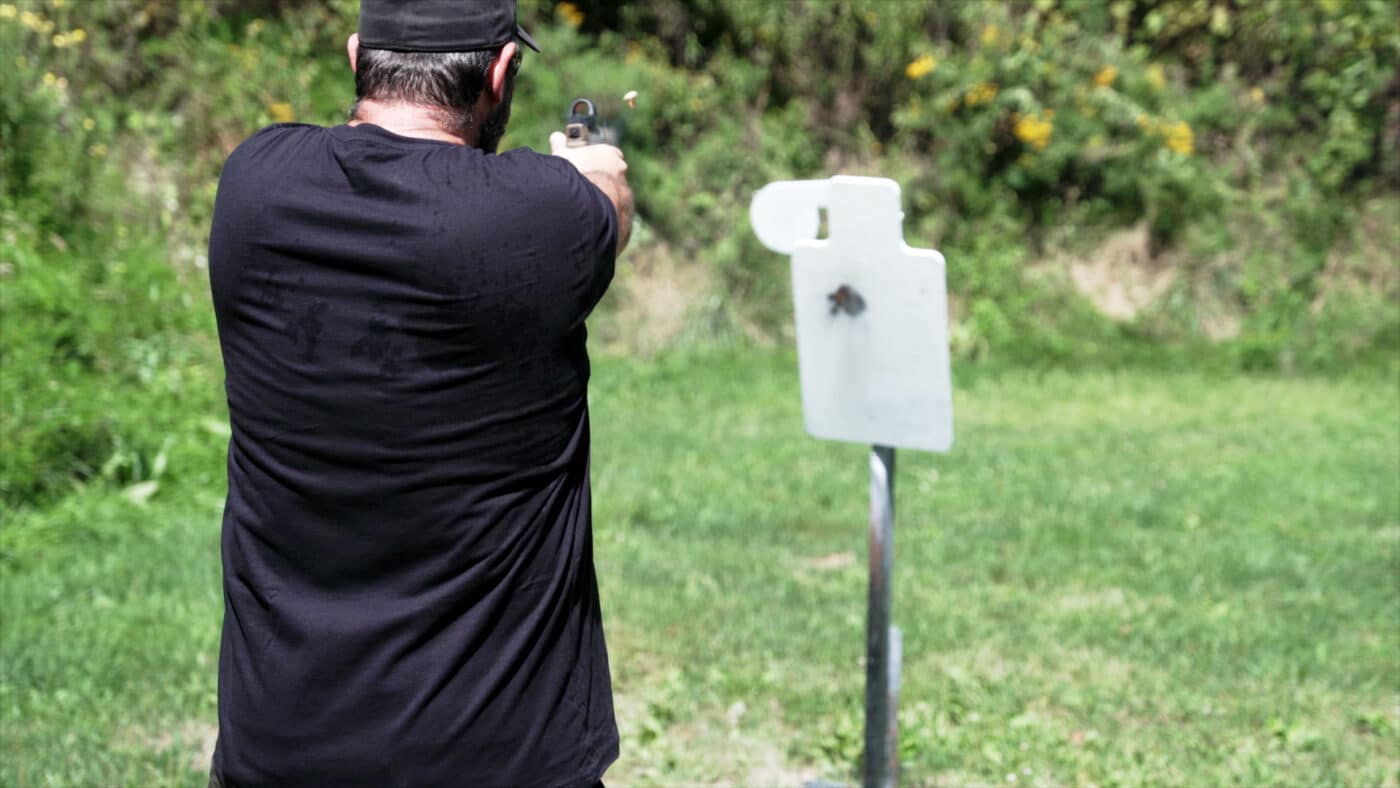 Man shooting steel targets with Norma frangible ammo