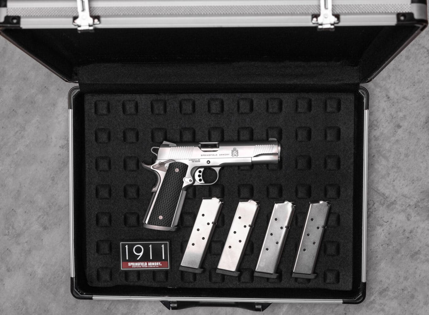 Stainless steel 1911 TRP from Springfield in a case with magazines