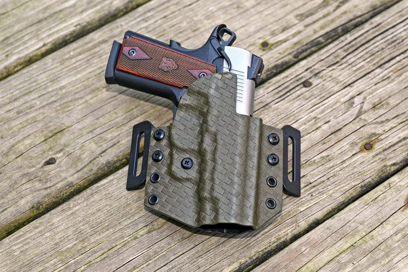 Upper Hand CCW holster with EMP pistol in it