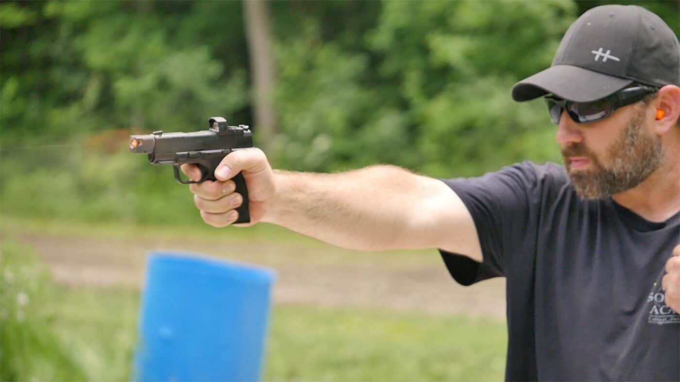 Man showing different shooting styles with the red dot sight