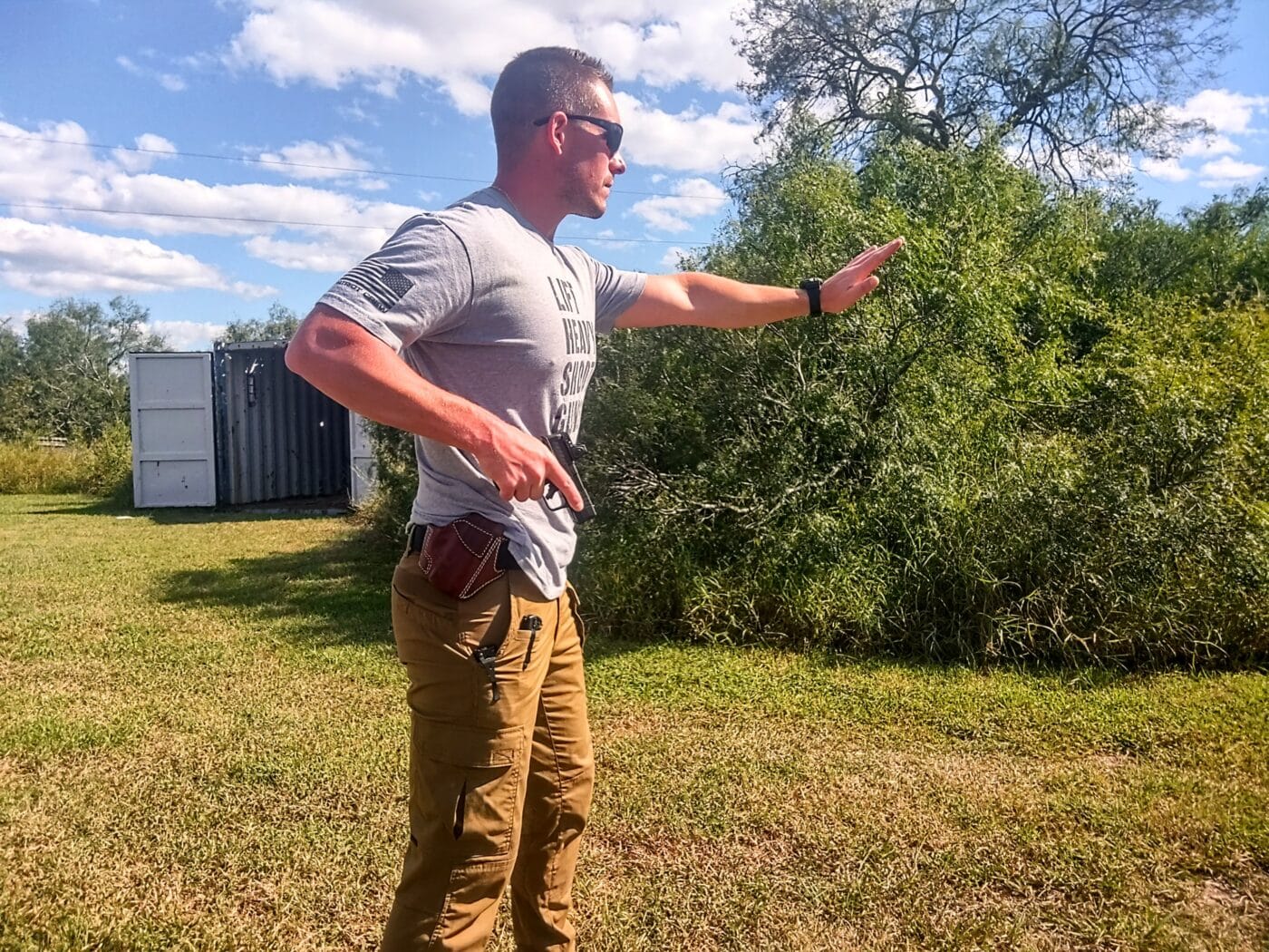 Man on the range drawing firearm from a Craft Holsters Panther