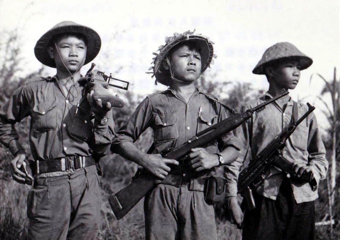 North Vietnamese soldiers with various firearms