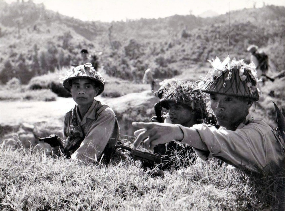 Viet Cong soldier with P38 pistol in 1966