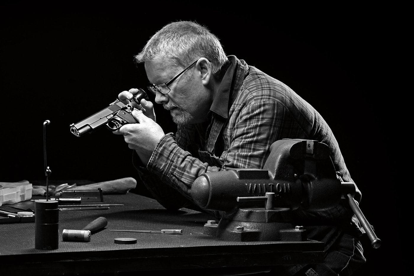 Springfield employee fixing a gun