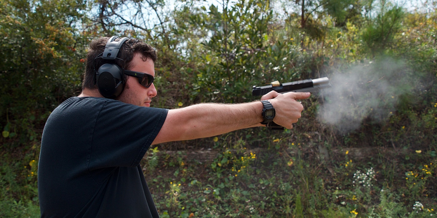 Man shooting Springfield Emissary 1911 with VZ grips