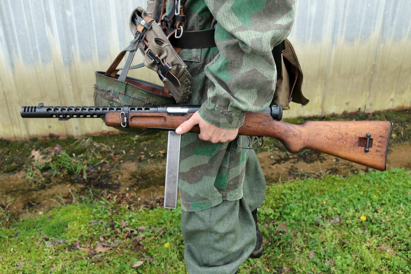 Man dressed as German paratrooper with Model 38A