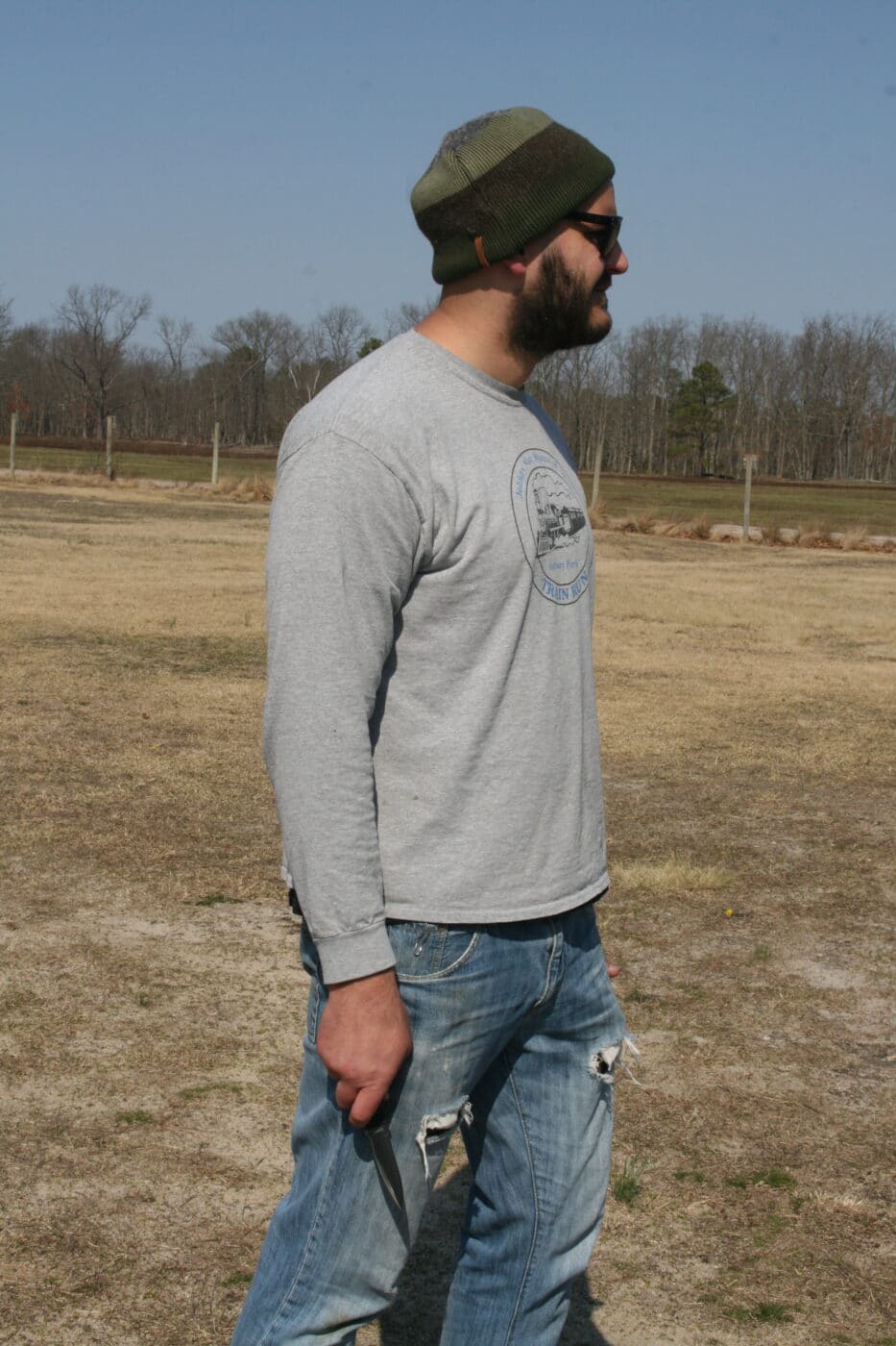 Man holding a knife as a potential threat