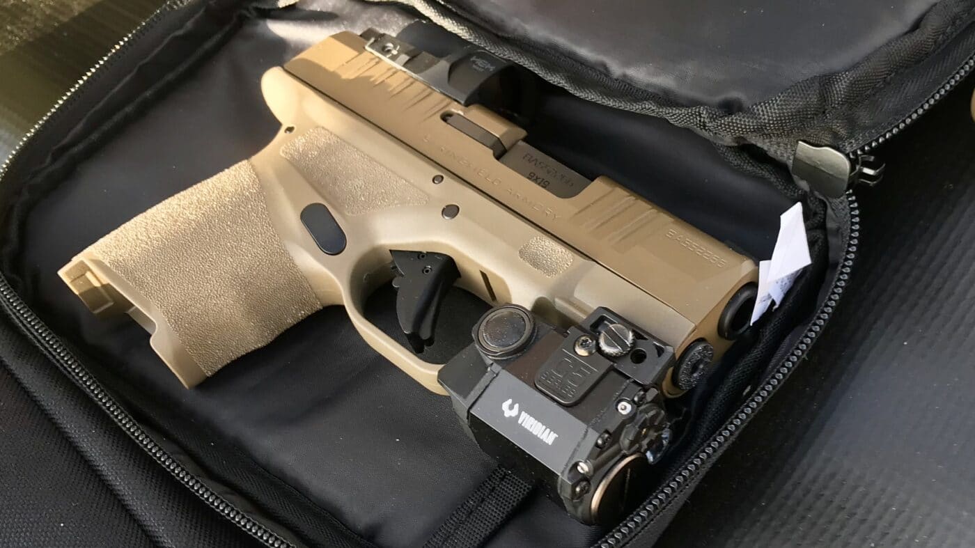 Springfield Armory Hellcat equipped with a Viridan C5 Laser.