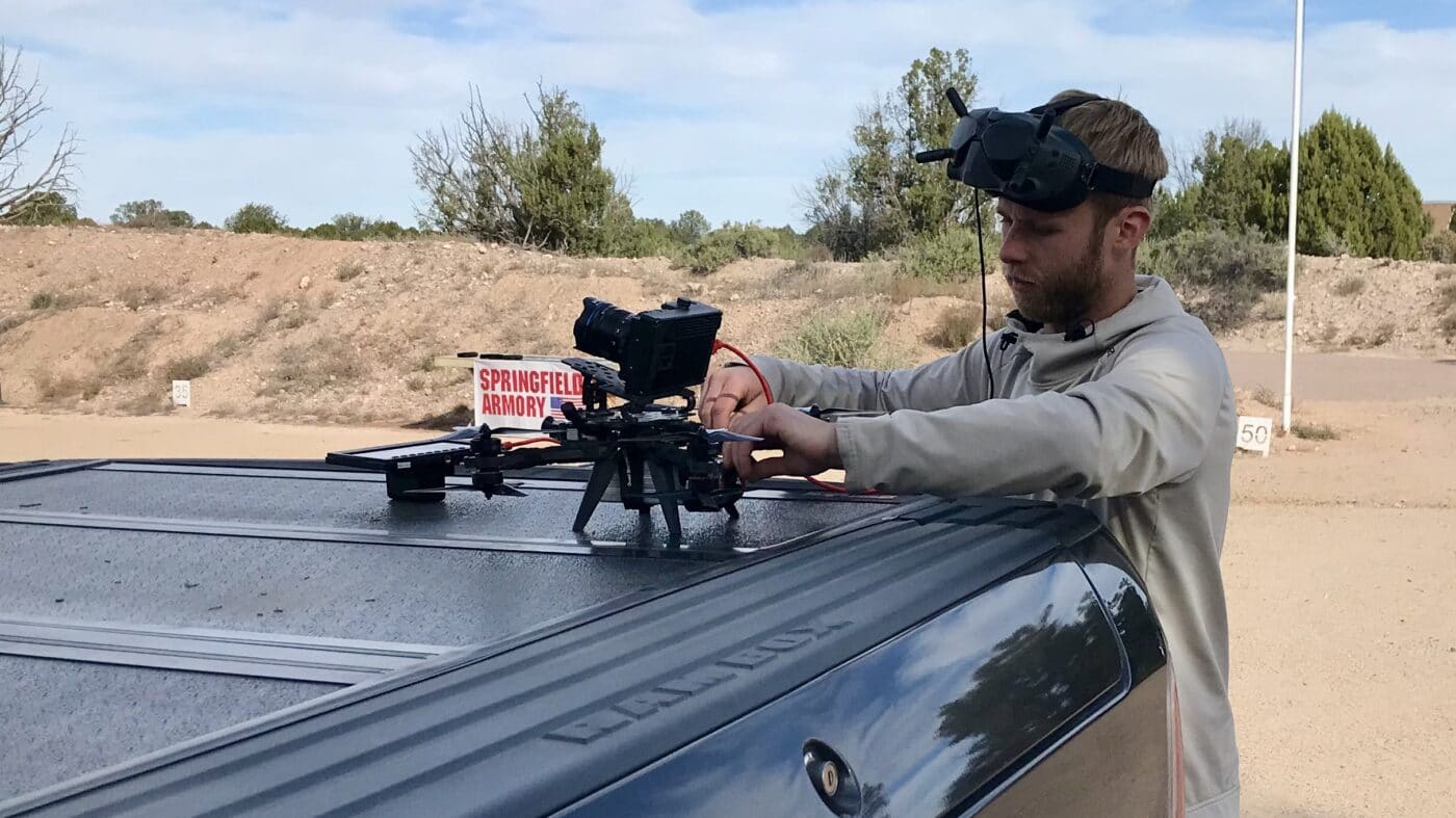 Jay Christensen, who acted as the lead cinematographer for the Full-Blown Tactical video, preparing a drone for an overhead shot