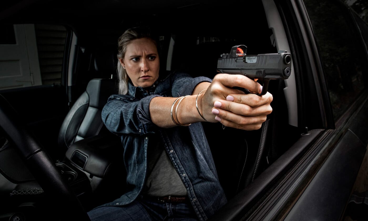 Woman shooting Hellcat pistol from car