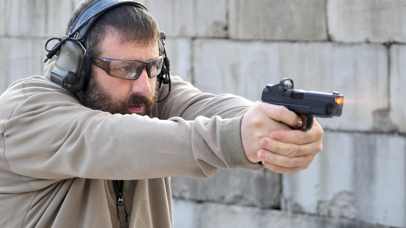 Man shooting the XD-S Mod.2 OSP 9mm