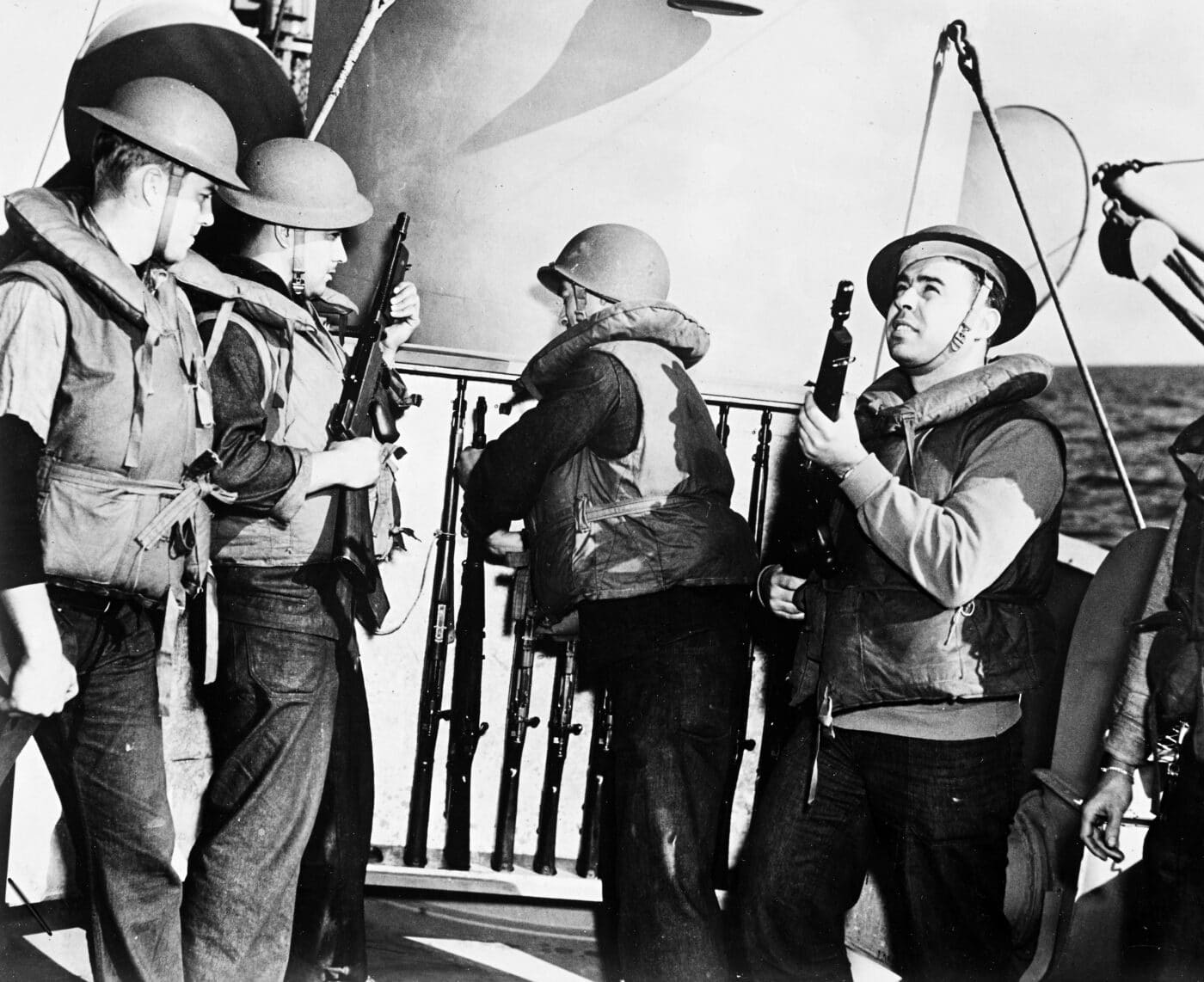 US Coast Guard crew with small arms during WWII