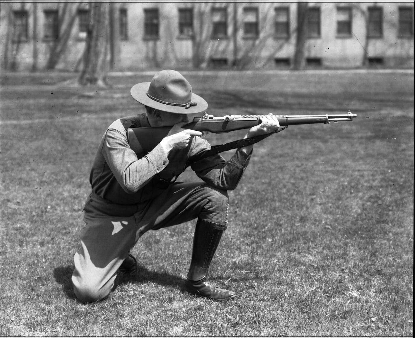 Soldier poses with the T3E1 Garand rifle