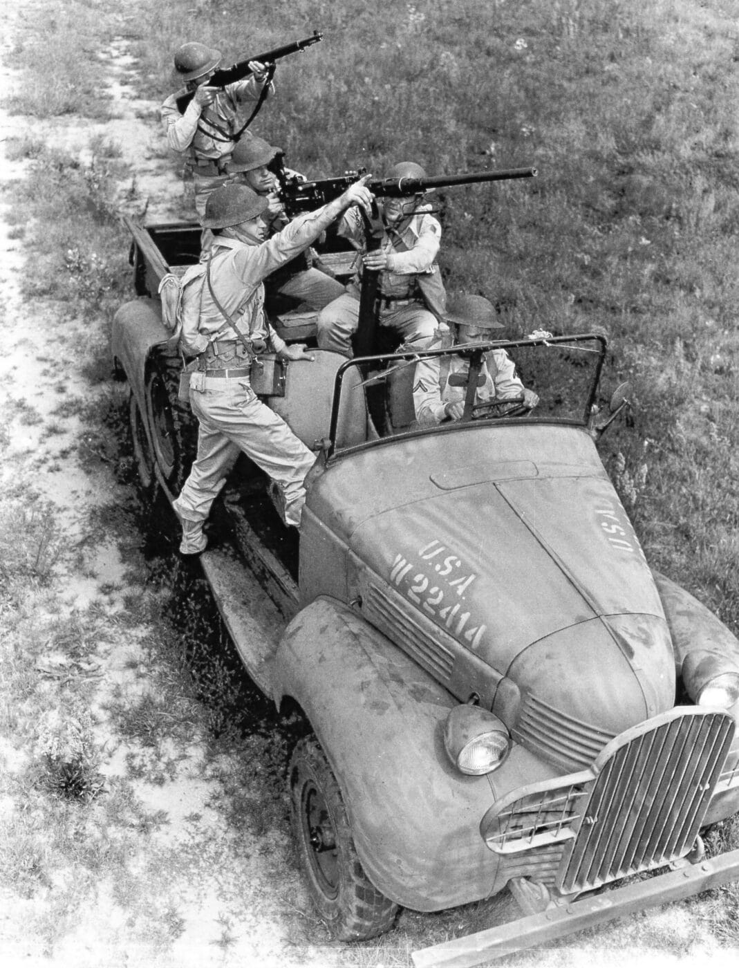 Soliders one a truck with a 50 cal pre-war mount