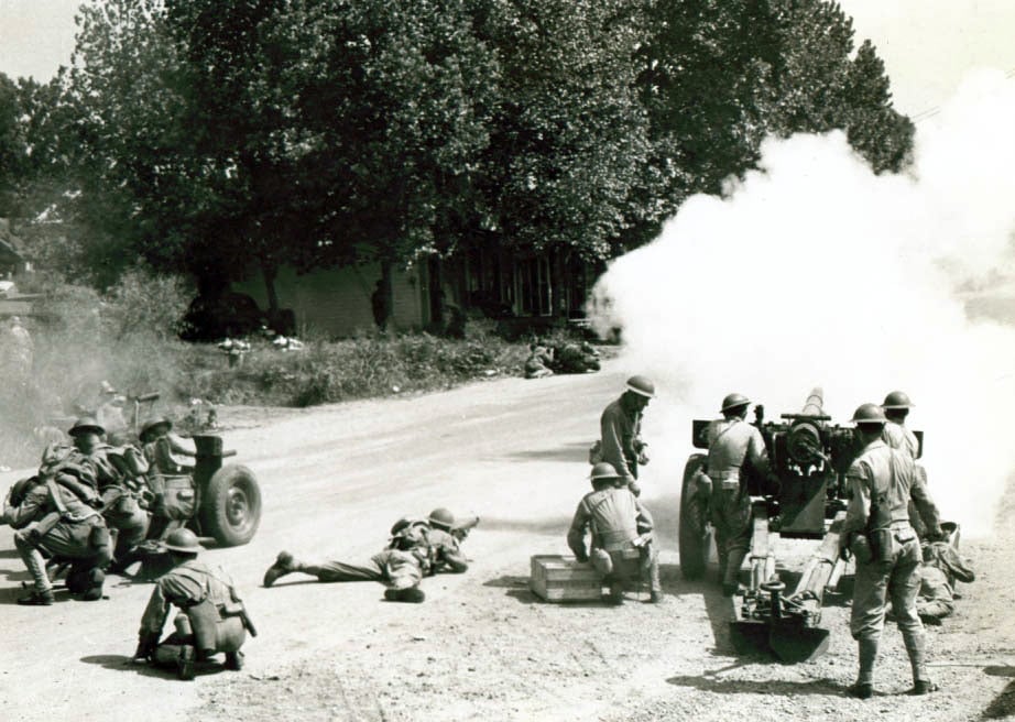 Men of the 27th Division from New York simulate an attack outside of Lake Charles, Louisiana