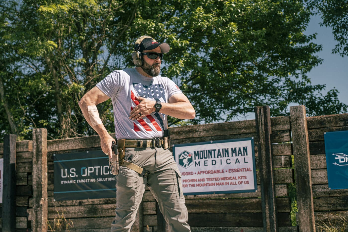 Man working the Blue Alpha battle belt on the range